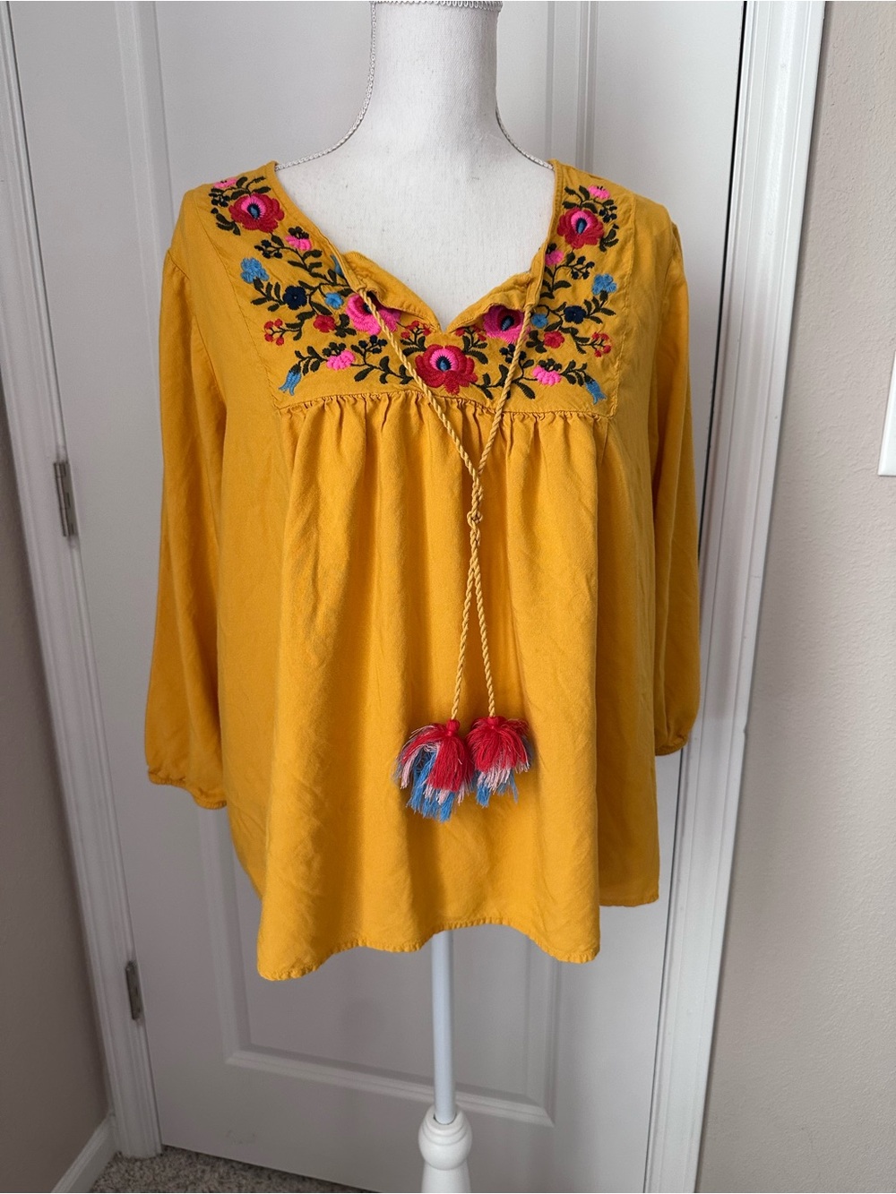 Embroidered Peasant Top with Tassels